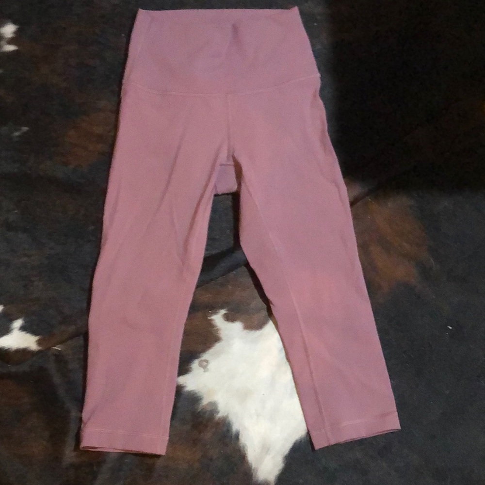 Never worn, in good condition cropped